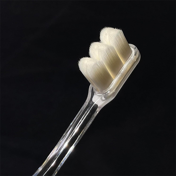 Orange Care dense and fine soft bristles small brush head 1